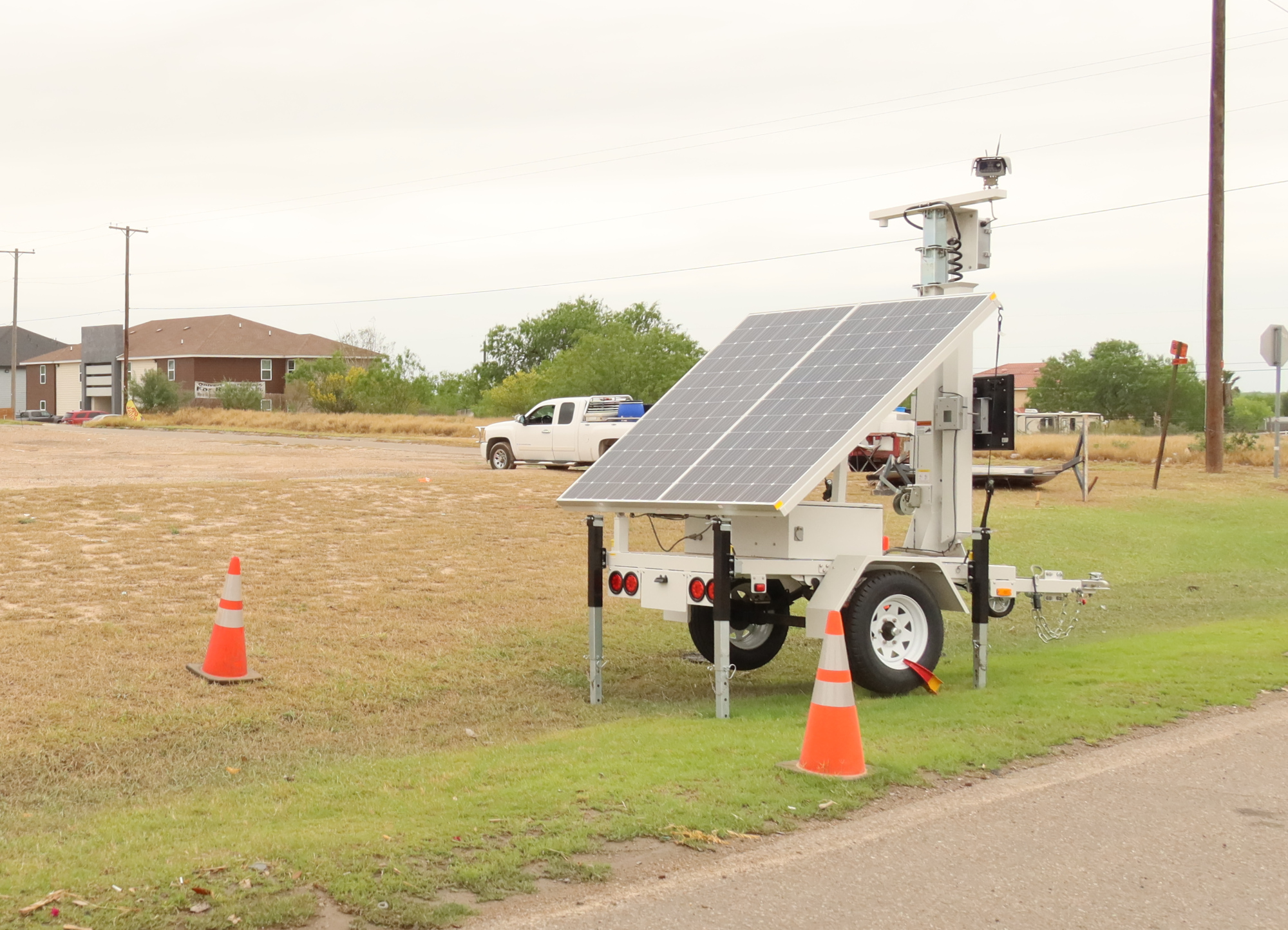 A trailer with a solar panel and an ALPR camera.